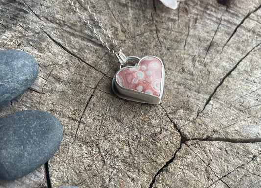 Galaxy Rhyolite heart pendant necklace designed for self-acceptance, emotional integration, and healing. Meaningful heart jewelry for inner growth.