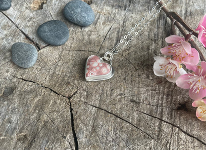 Galaxy Rhyolite heart pendant necklace designed for self-acceptance, emotional integration, and healing. Meaningful heart jewelry for inner growth.