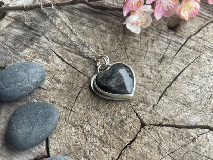 Silver sheen obsidian heart pendant necklace designed for reflection, clarity, and grounding. Meaningful heart jewelry to support inner truth.