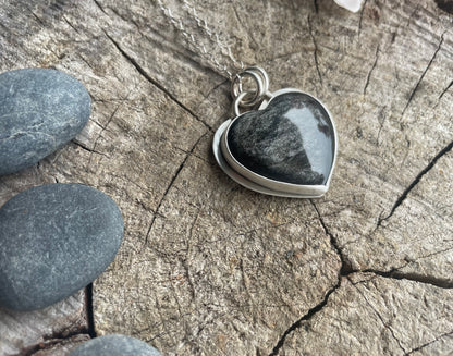Silver sheen obsidian heart pendant necklace designed for reflection, clarity, and grounding. Meaningful heart jewelry to support inner truth.