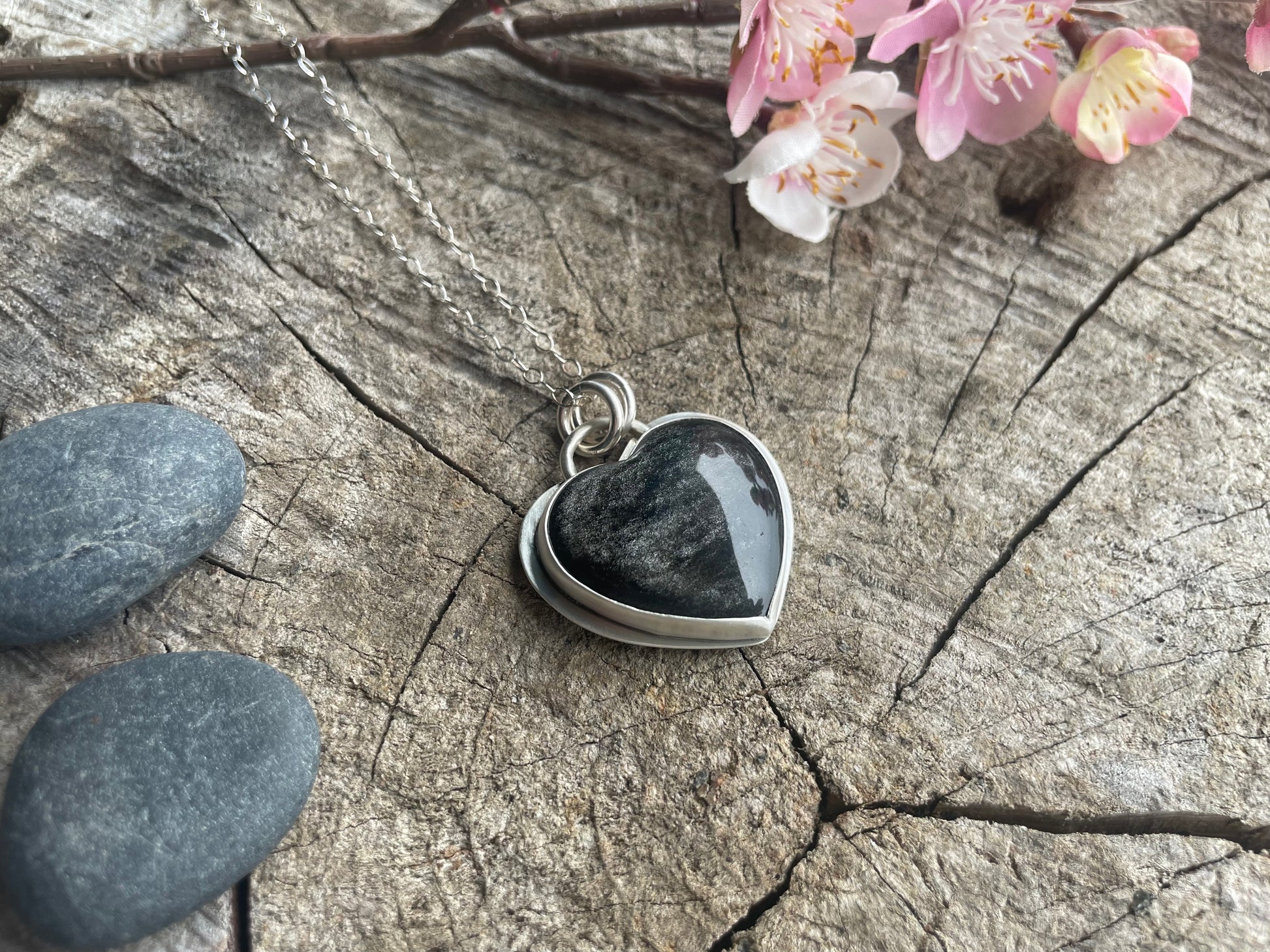 Silver sheen obsidian heart pendant necklace designed for reflection, clarity, and grounding. Meaningful heart jewelry to support inner truth.